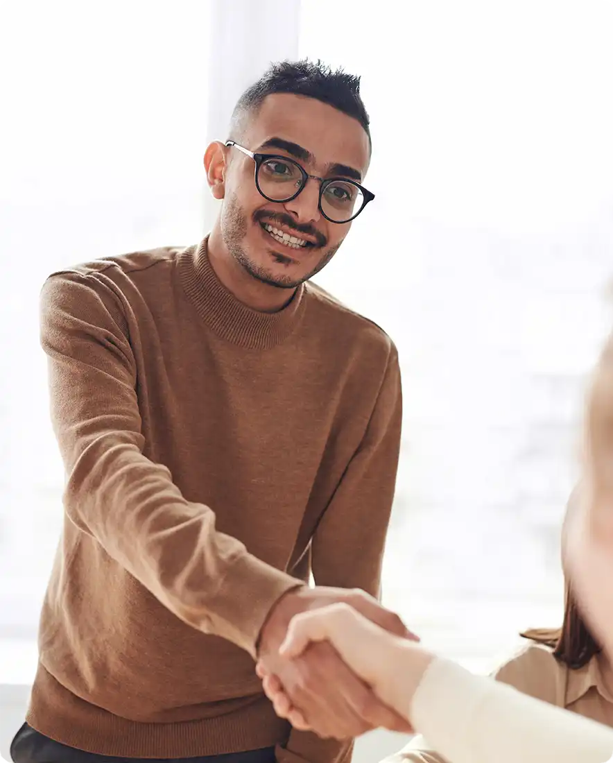 young man shaking hands
